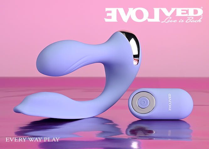 Evolved EVERY WAY PLAY Wearabe Vibrator side angle and remote control on pink gradient background