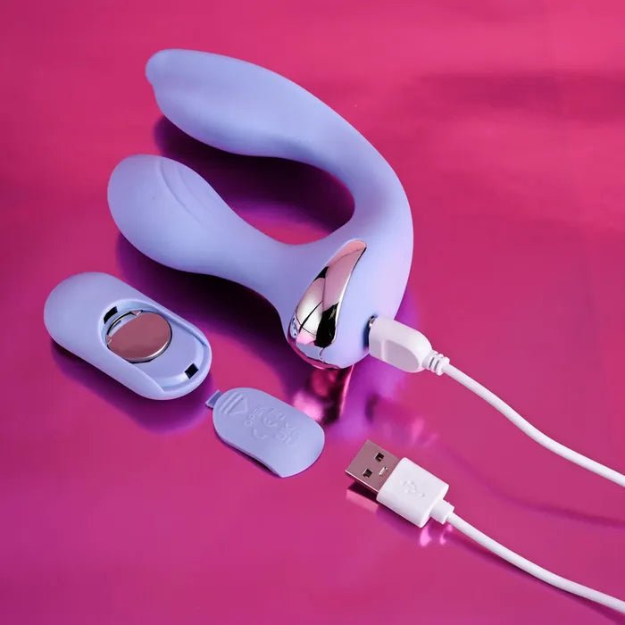 Evolved EVERY WAY PLAY Wearabe Vibrator with USB cable plugged in and showing remote battery